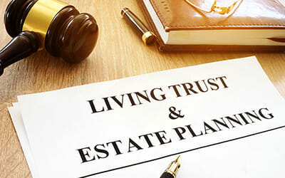 Van Gils Law Firm, Wills, Trusts and Estates: Trusts, A living trust and estate planning form on a desk.